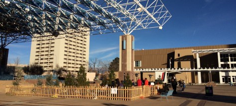 Families enjoying the slightly smaller than expected ice skating rink on Civic Plaza.
